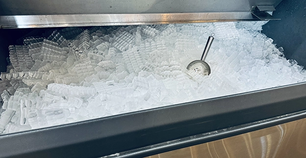 Ice in a commercial ice machine.