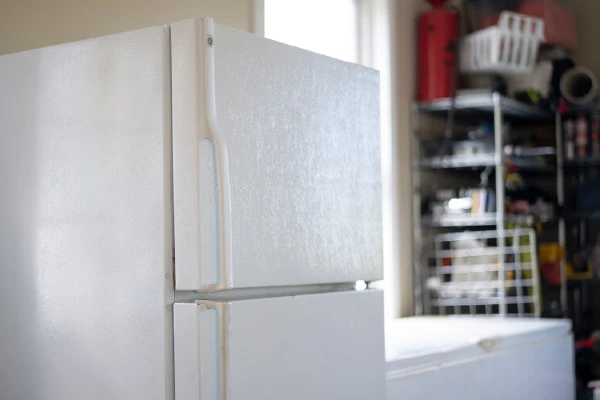 White fridge in a garage