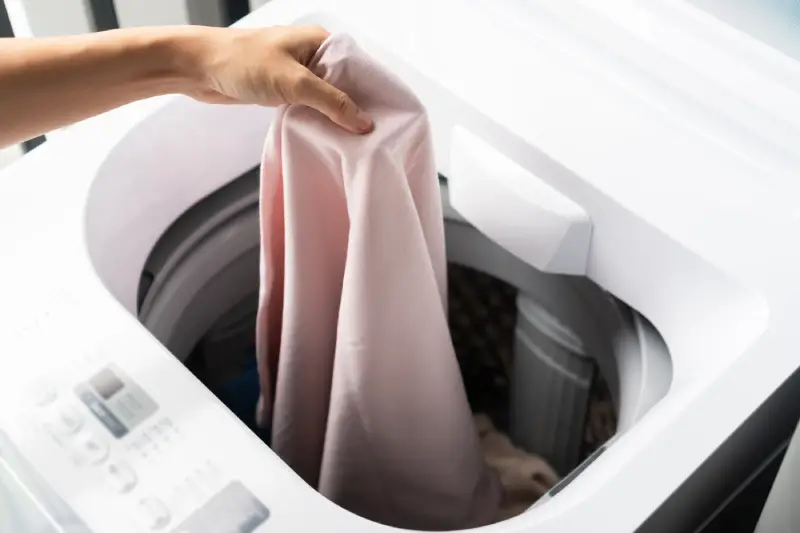 How to Clean and Maintain the Lint Filter in Your Washing Machine -  ApplianceCare